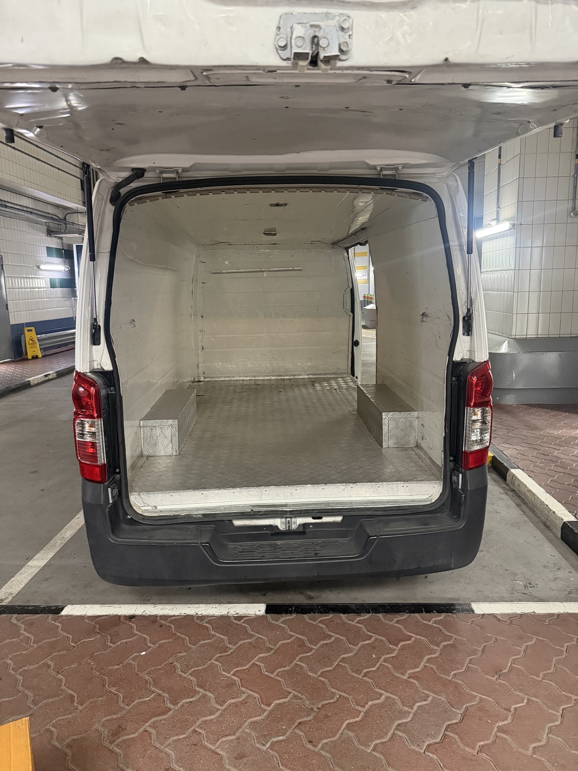Real cargo area of luggage delivery van in Dubai
